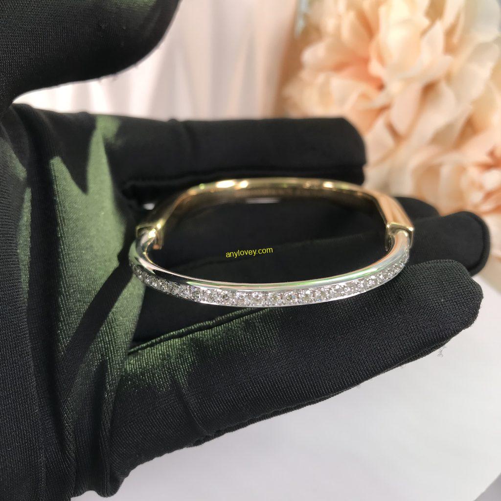 TIFFANY&CO 18CT YELLOW AND WHITE GOLD LOCK BANGLE WITH HALF PAVE DIAMOND