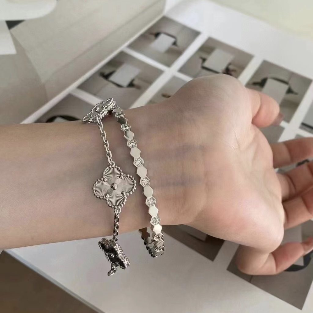 Chaumet bee my love stack with van cleef bracelet and Cartie love bracelet 