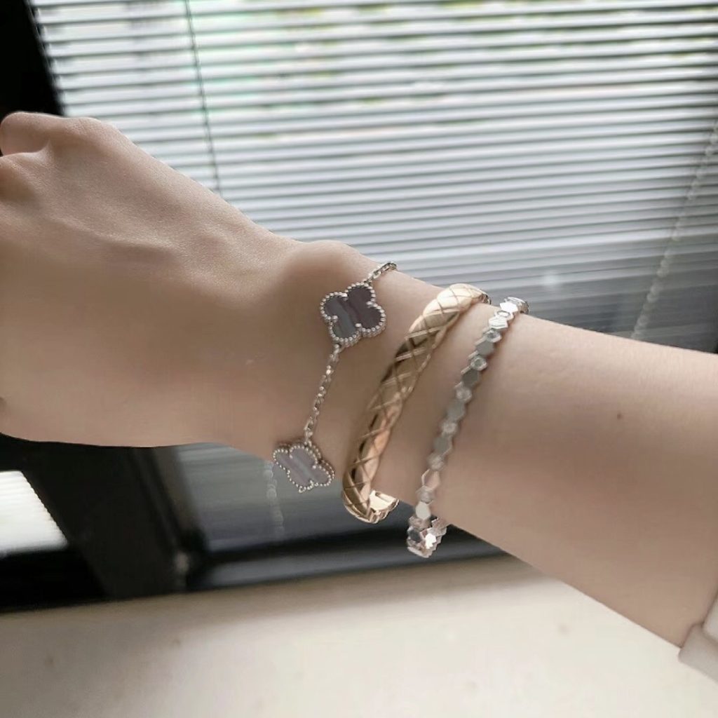 Chaumet bee my love stack with van cleef bracelet and Cartie love bracelet 